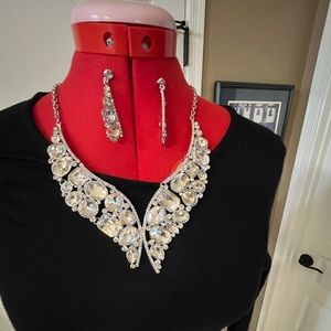 Costume jewelry, clear crystal, silver tone. Necklace and earrings.